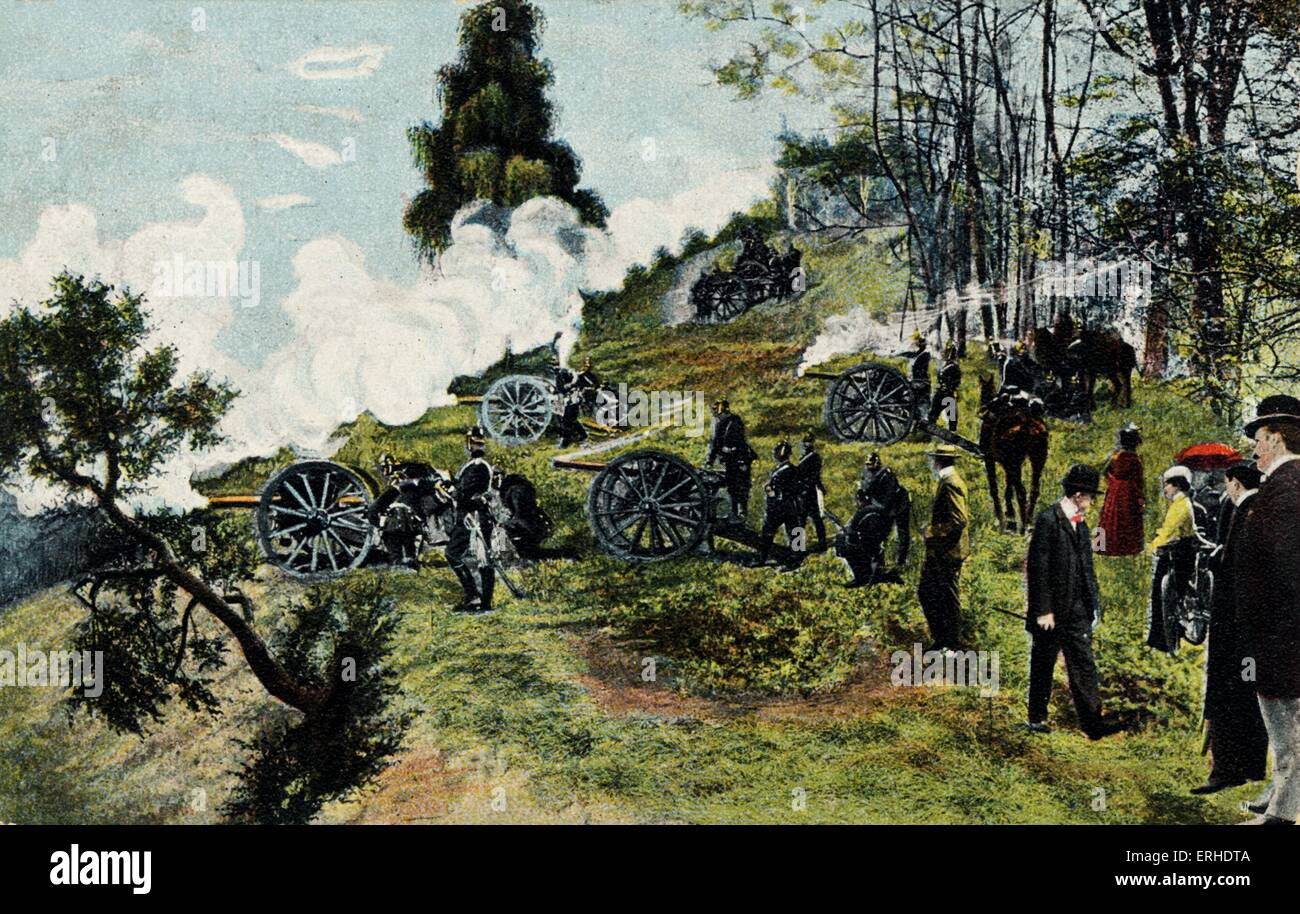 Guerra franco-prussiana in scena con la gente locale a guardare i soldati tedeschi fare pratica con i loro cannoni durante le esercitazioni militari. Foto Stock