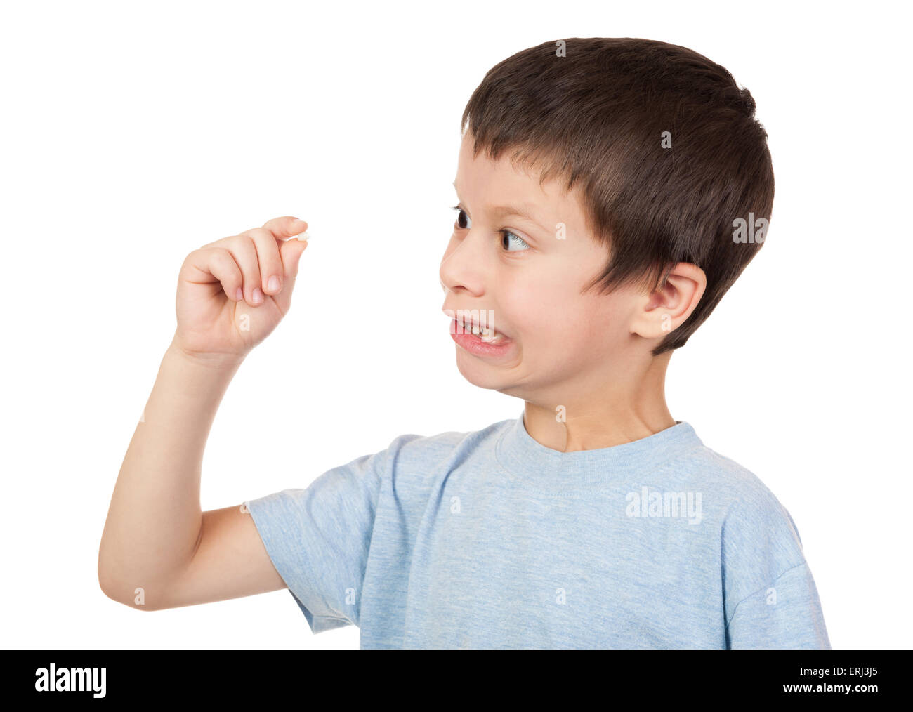 Ragazzo guarda al dente perduto Foto Stock