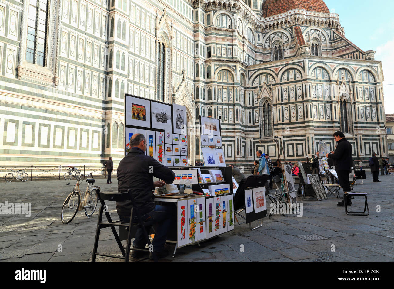 Artisti di strada alla Cattedrale di Santa Maria del Fiore, Firenze Foto Stock