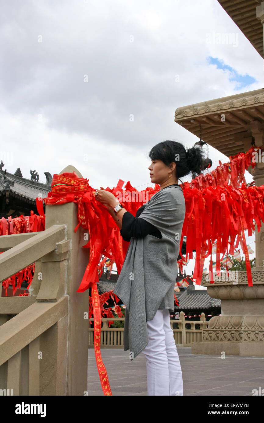 Reggicalze con la preghiera la sacra pagoda. Foto Stock