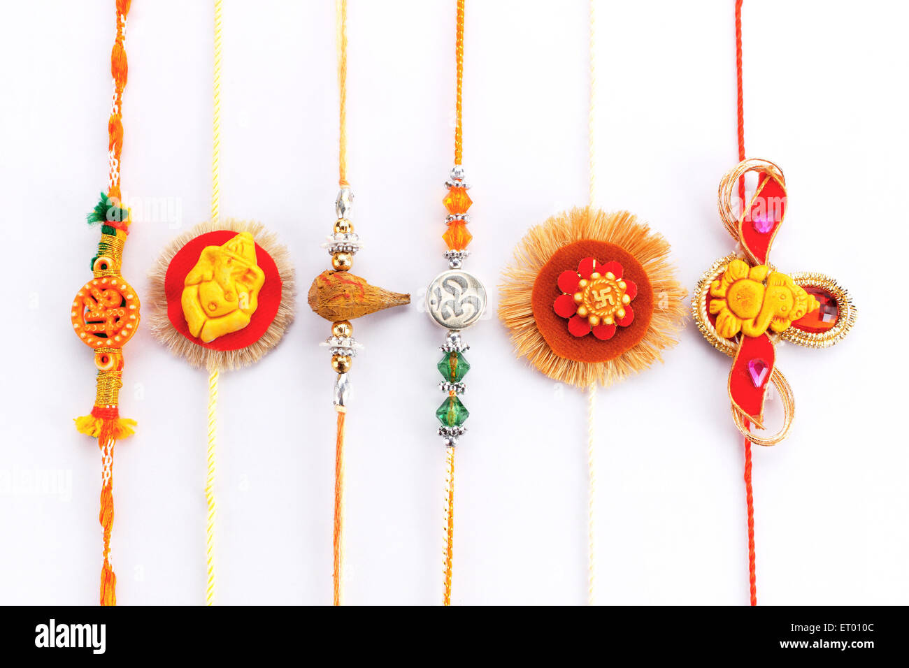 Rakhi con simboli religiosi ; Raksha Bandhan festival ; India Foto Stock