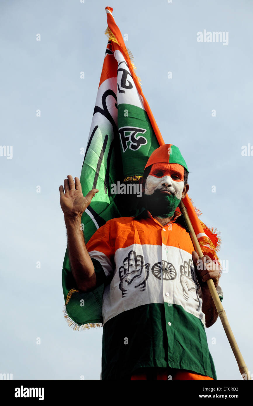 Bandiera indiana dell'India dipinta sul volto e bandiera del partito del Congresso India MR#769B Foto Stock