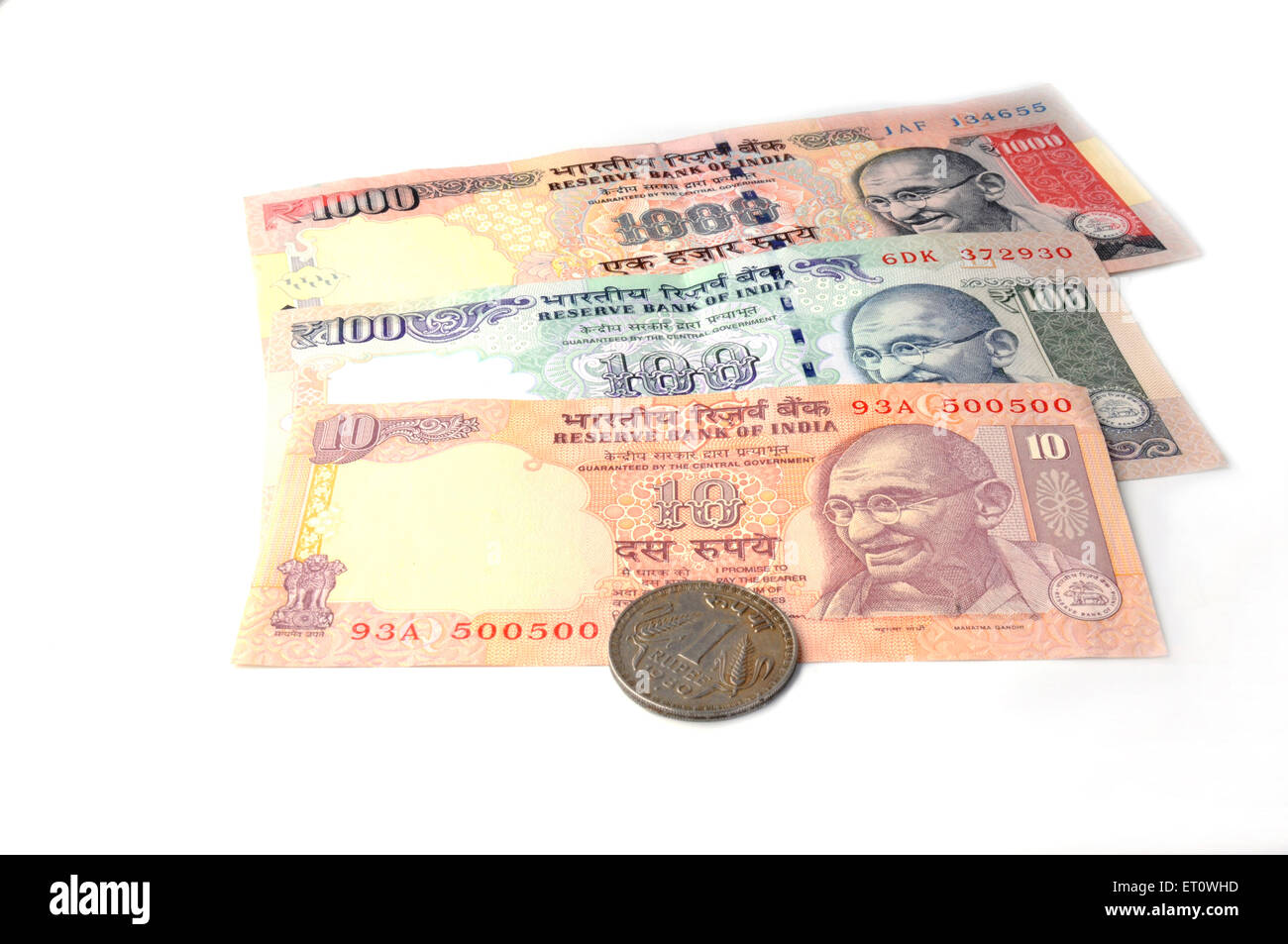 Concetto di valuta indiana alle banconote e alle monete Foto Stock