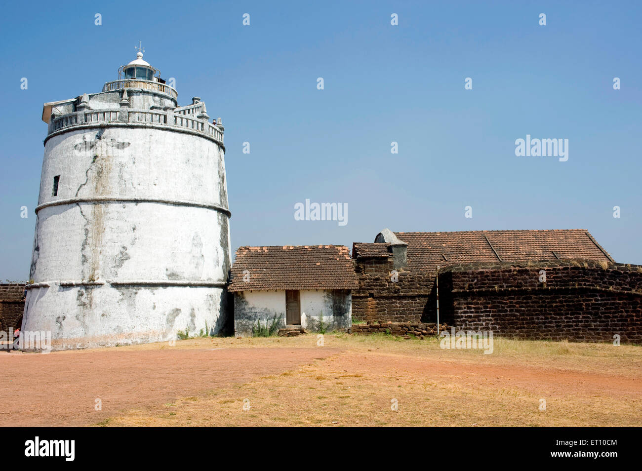 Light house e case in alto a fort Aguada ; Goa ; India Foto Stock