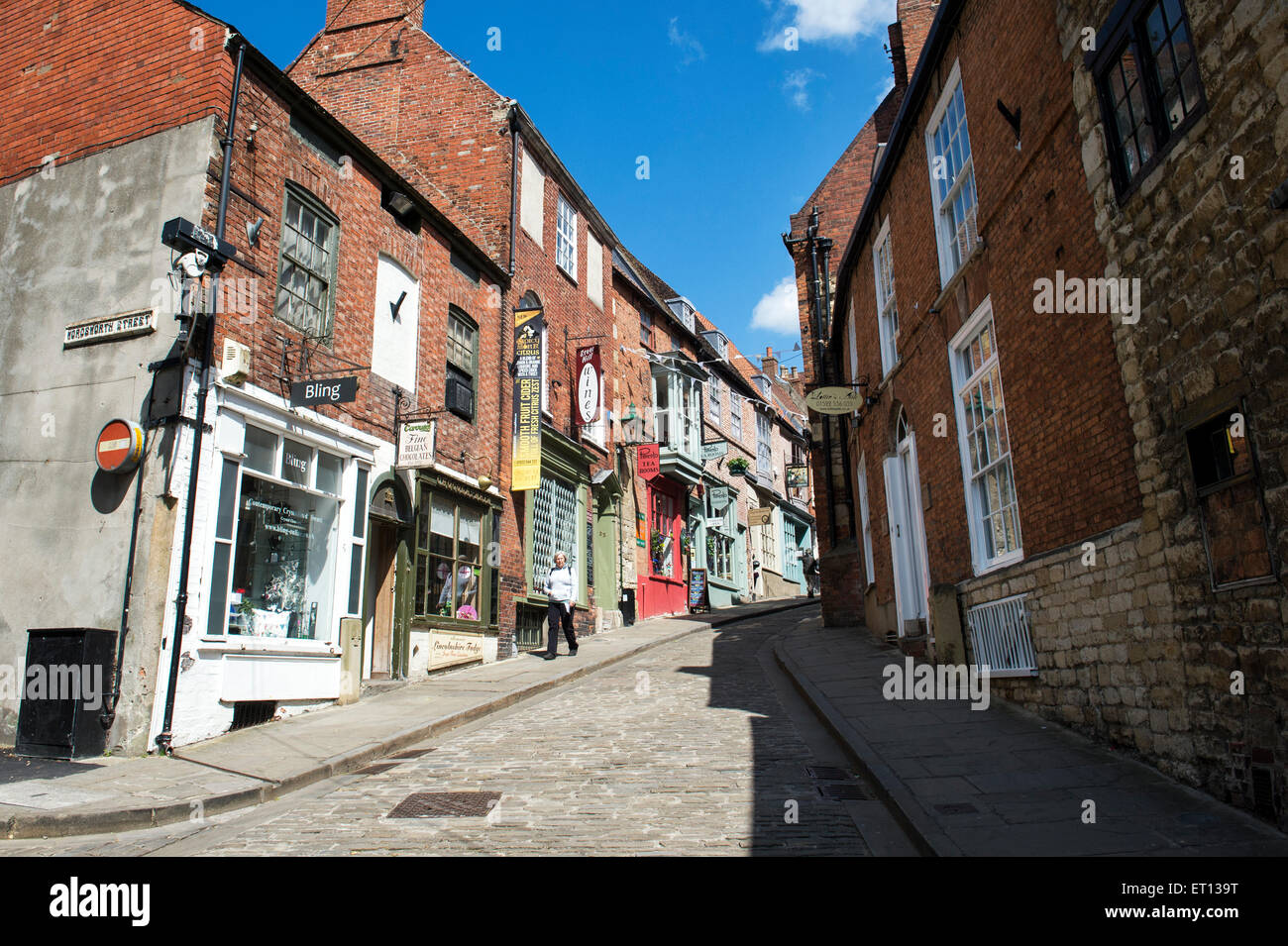 Negozi ed edifici, ripida collina, Lincoln, Lincolnshire, Inghilterra Foto Stock