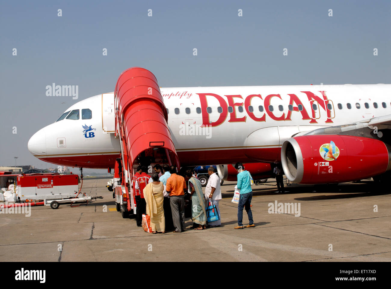 Passeggeri a bordo dell'aereo Deccan, India Foto Stock
