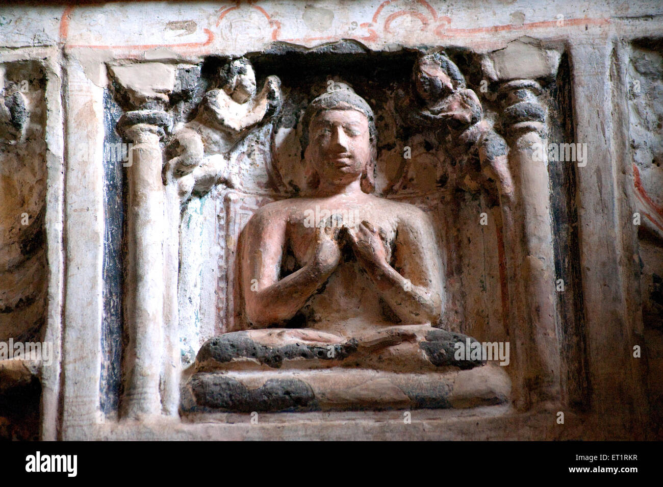 Rilievo scolpito di Buddha alle grotte di Ajanta Aurangabad Maharashtra India arte indiana asia scultura di buddha asiatico Foto Stock