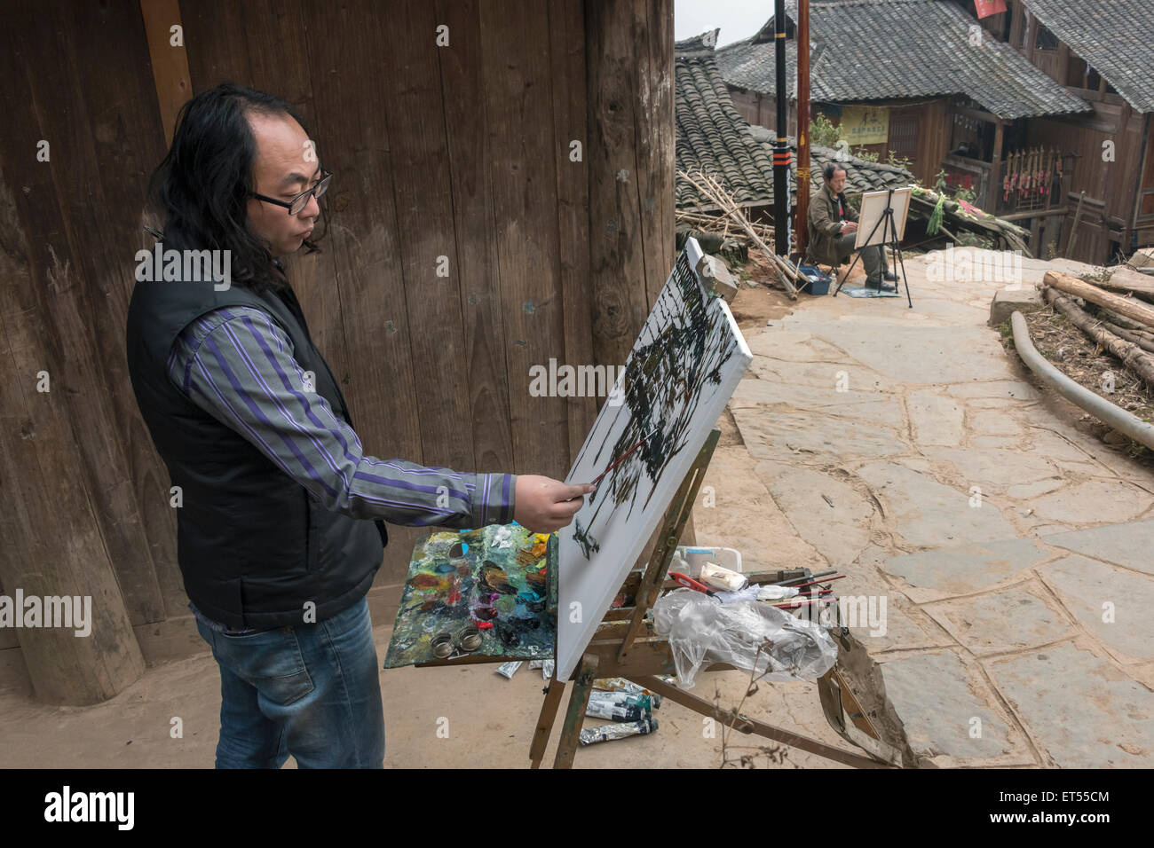 Artisti in Basha Miao village, Basha Gun Village, Guizhou, Cina Foto Stock Artisti in Basha Miao village, Basha Gun Village, Guizhou, Cina Foto Stock