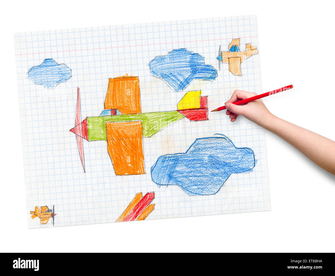 In aereo sulla carta a scacchi. bambini disegno mano con matita colorata. Foto Stock