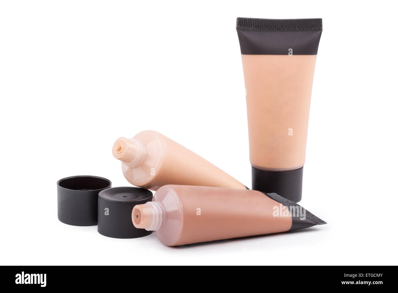 Provette con liquido di reintegro foundation, primo piano su sfondo bianco Foto Stock