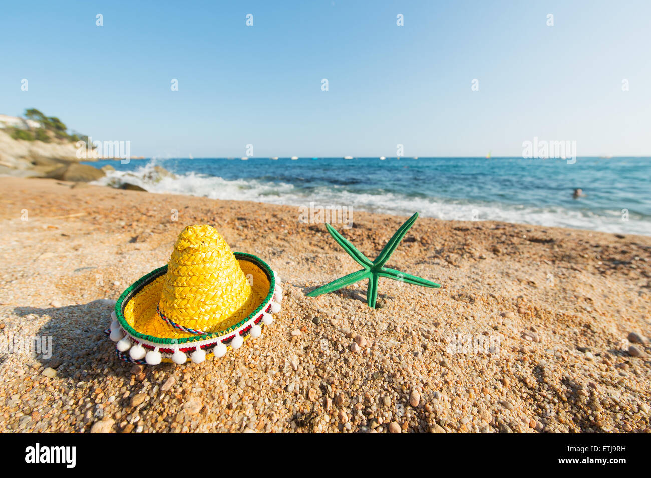 Sombrero e la stella di mare presso la spiaggia di spagnolo Foto Stock