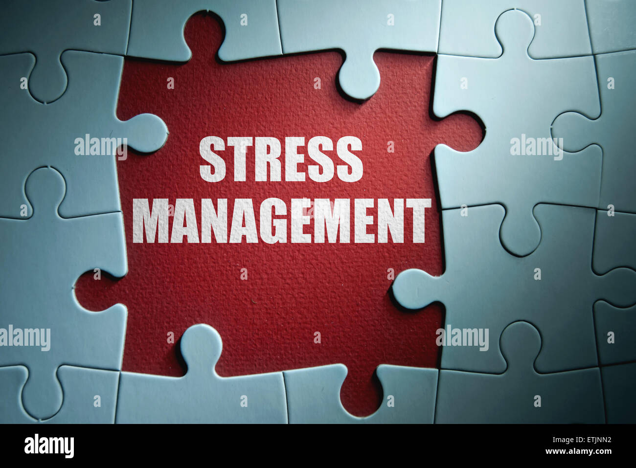 Pezzi mancanti da un puzzle rivelando la gestione dello stress Foto Stock