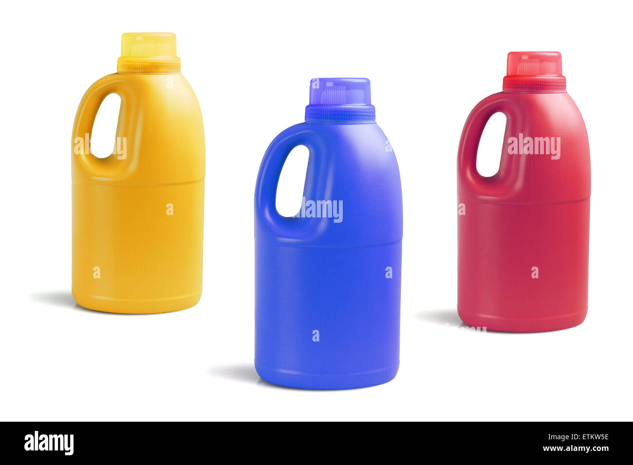 Tre bottiglie colorate di detersivo su sfondo bianco Foto Stock