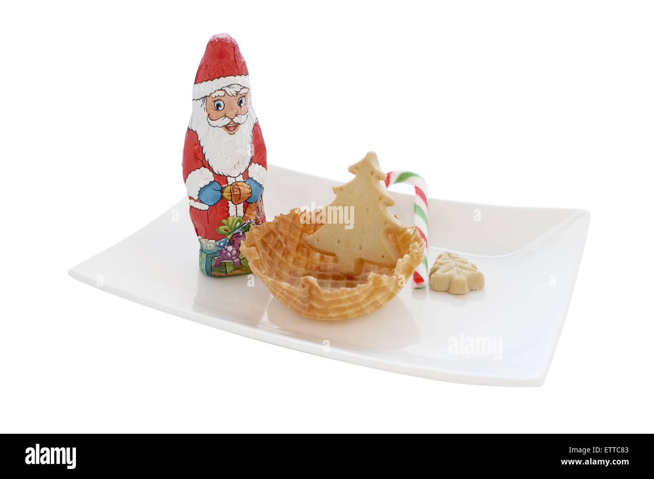 Il gelato in cono in cialda / Ciotola con decorazione di Natale isolato su sfondo bianco Foto Stock