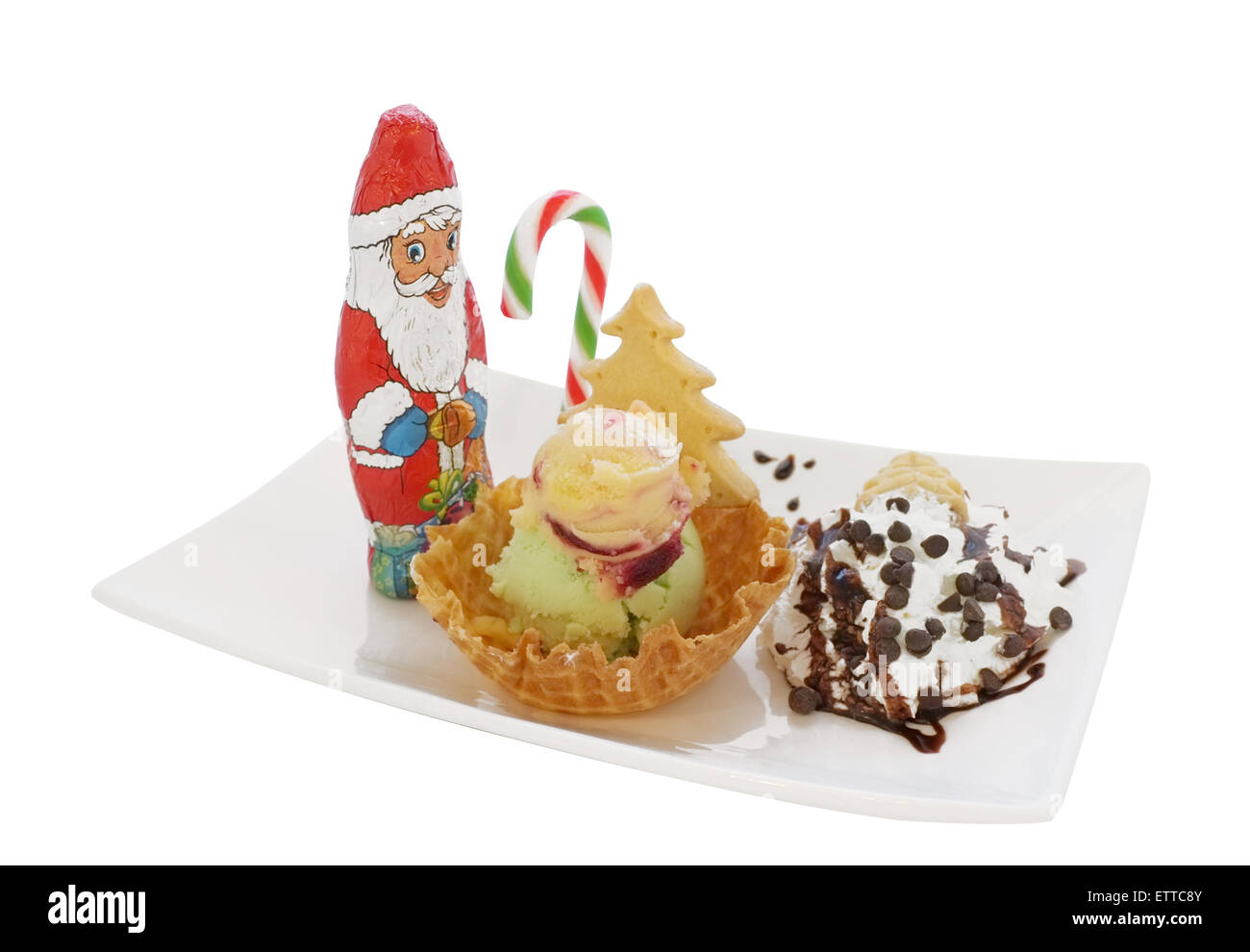 Il gelato in cono in cialda / Ciotola con decorazione di Natale isolato su sfondo bianco Foto Stock