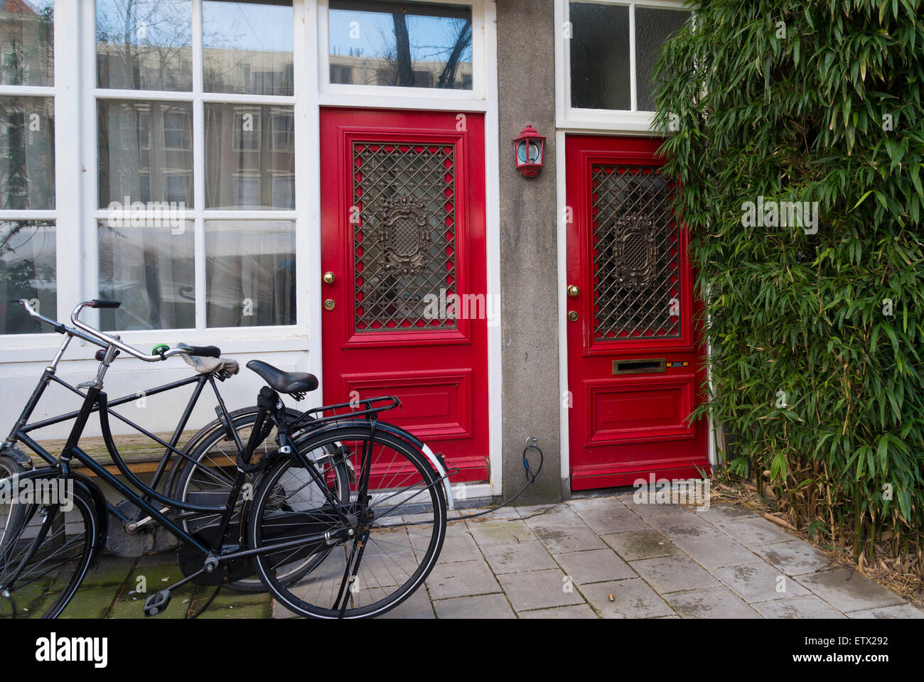 Doppia porta rossa nel centro di amsterdam Foto Stock