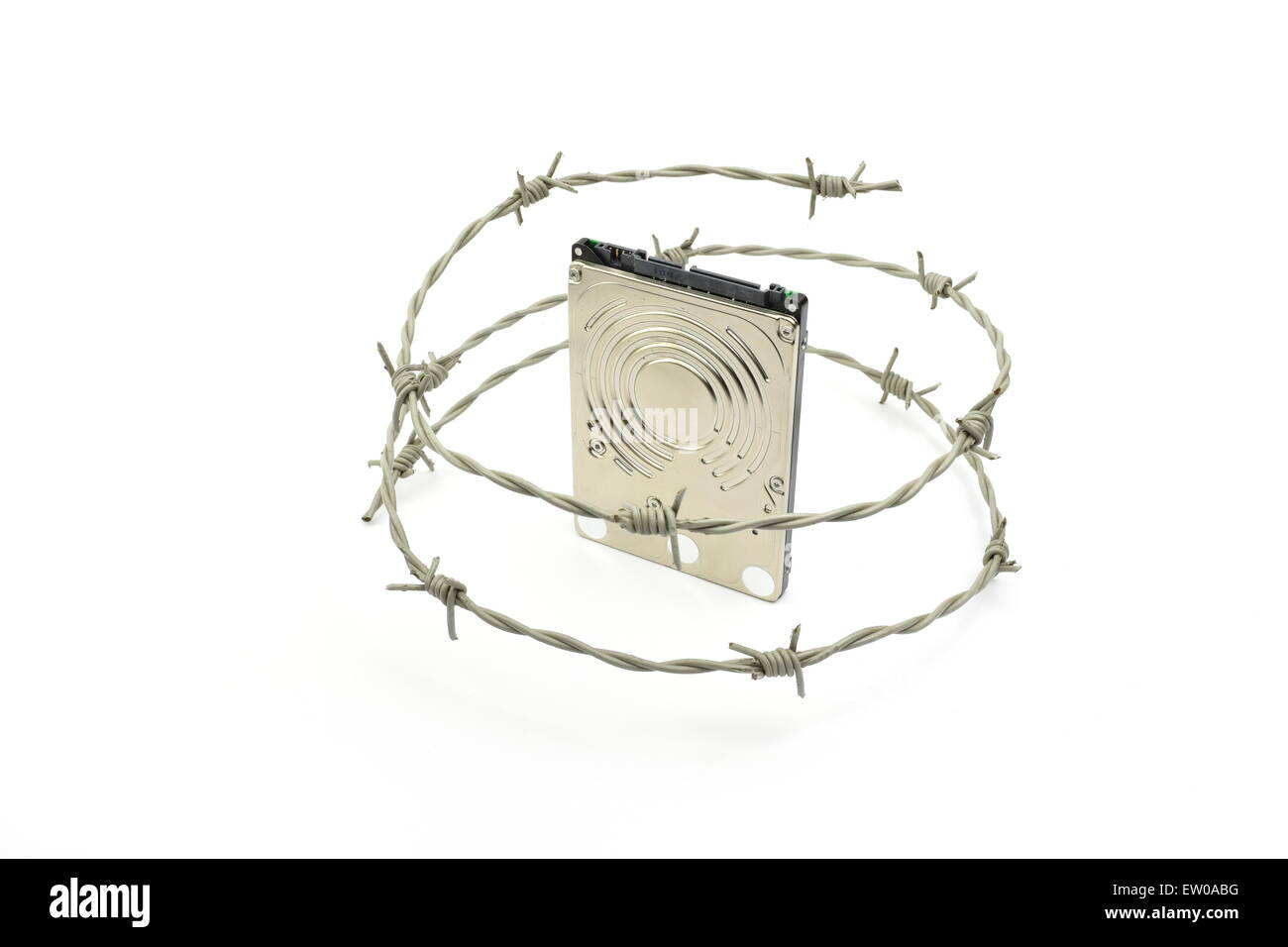 Harddisk dietro barbwire - illustrazione della sicurezza dei dati concetto. Foto Stock