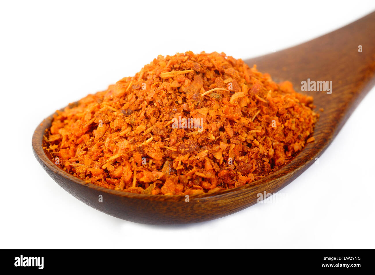 Il pepe di cayenna in cucchiaio di legno Foto Stock