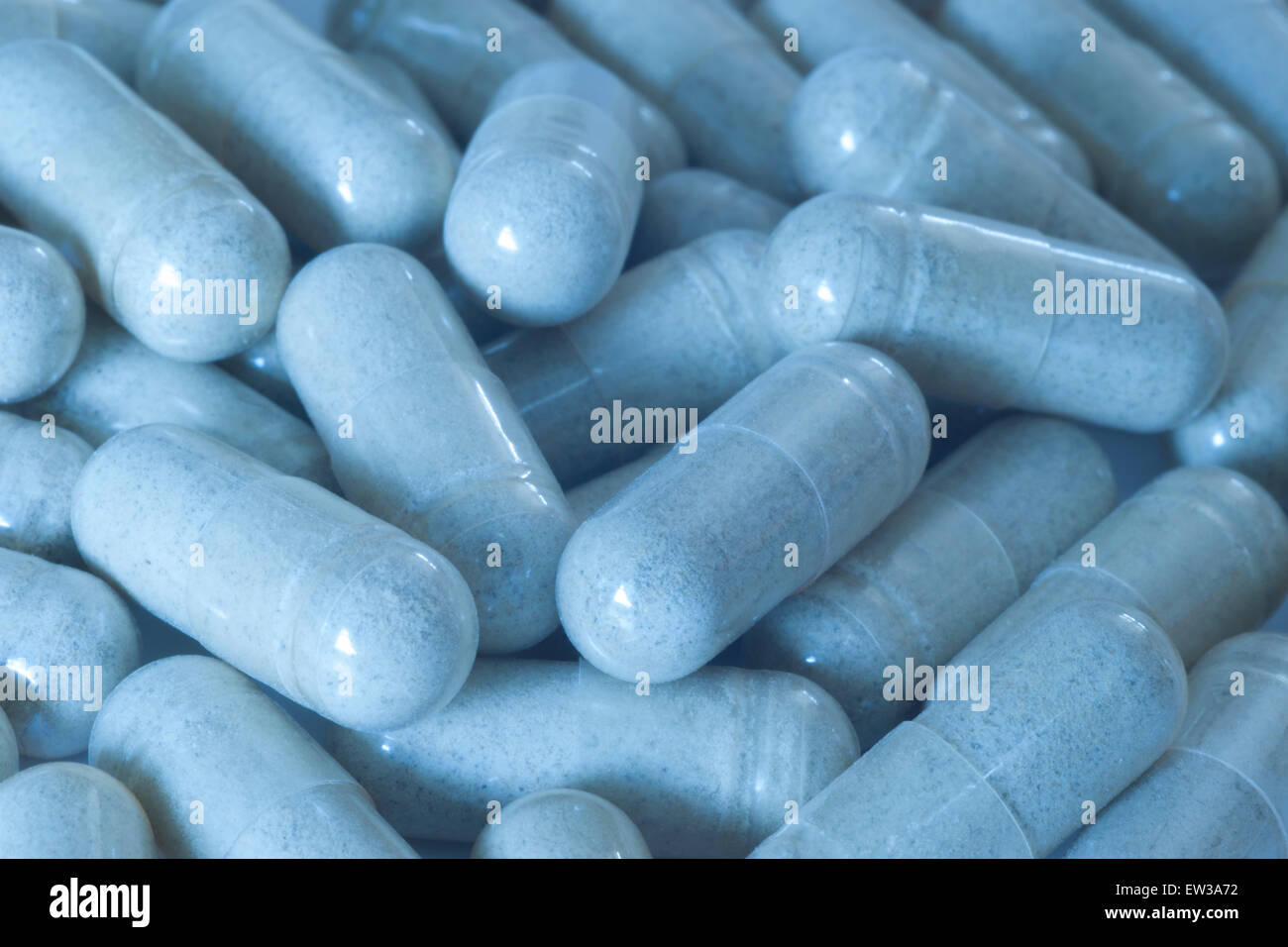 Farmaco Generico capsule in sfumature di blu formando uno sfondo. Foto Stock