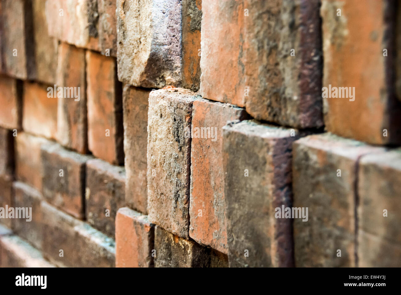 Mattoni, costruzione, strati, arancio, astratta, ruvida, texture, righe orizzontali, edificio, materiali, materie Foto Stock