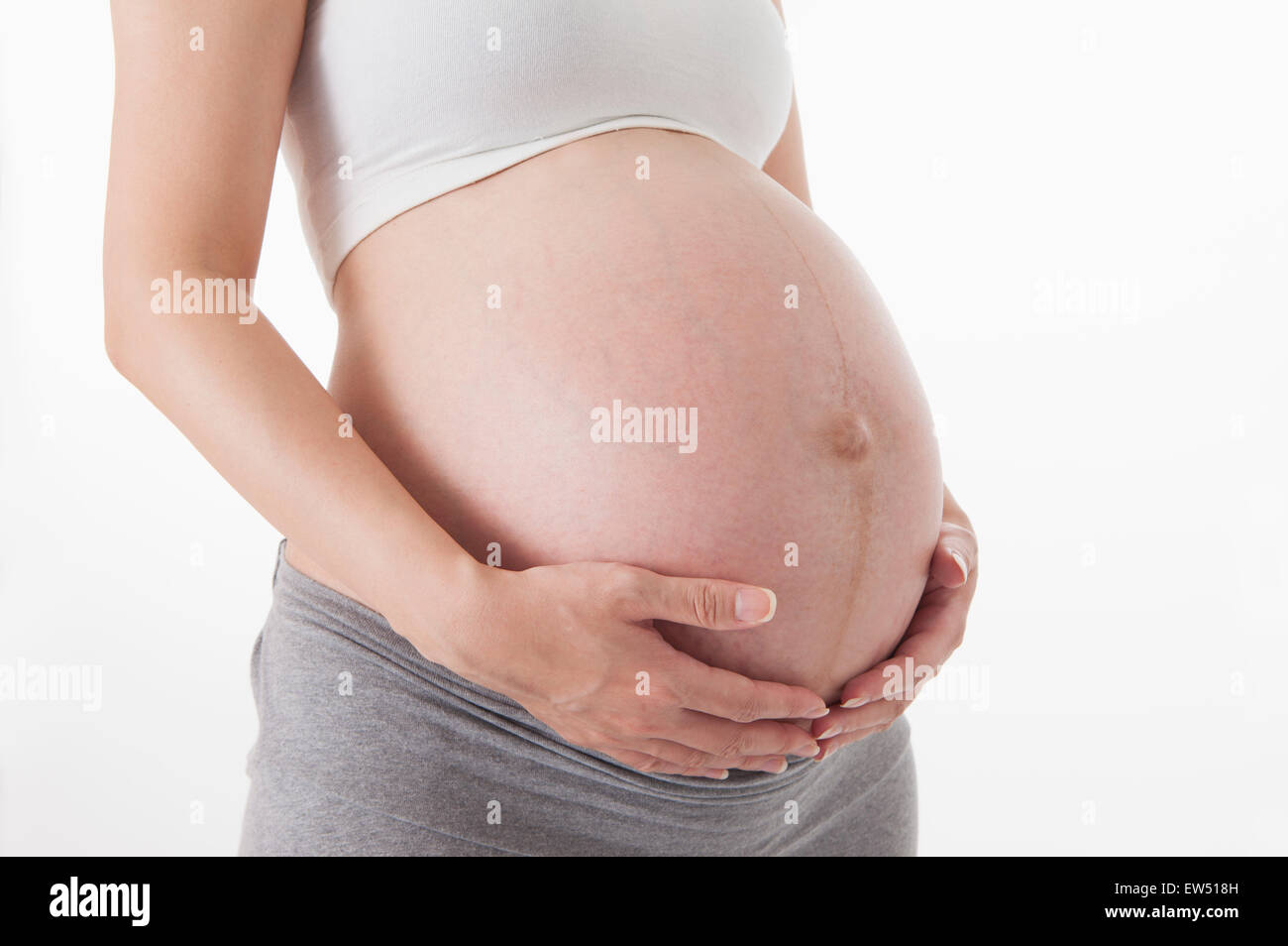Close-up di della donna incinta, addome, Foto Stock