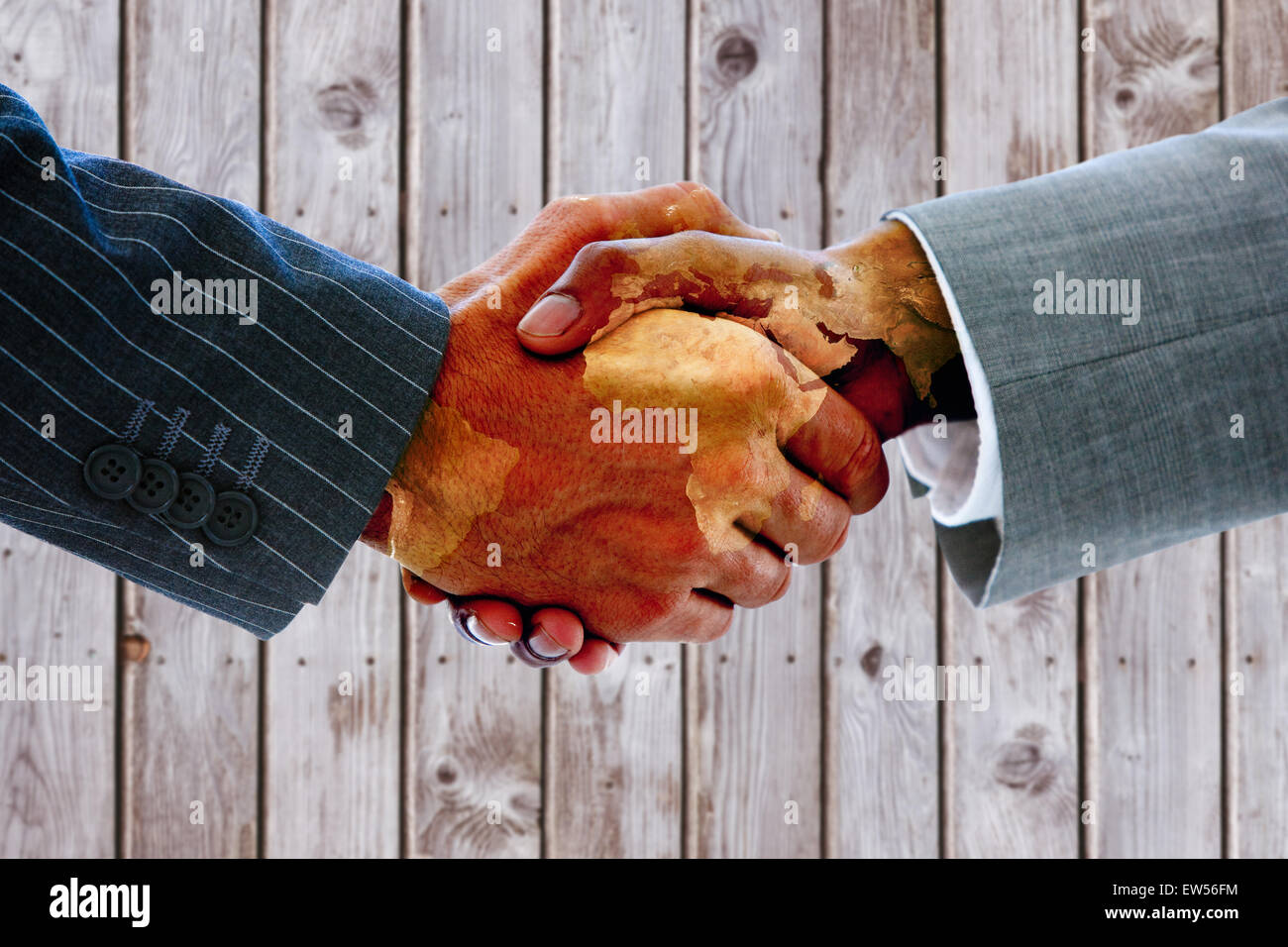 Immagine composita di uomini di affari che stringono le mani Foto Stock