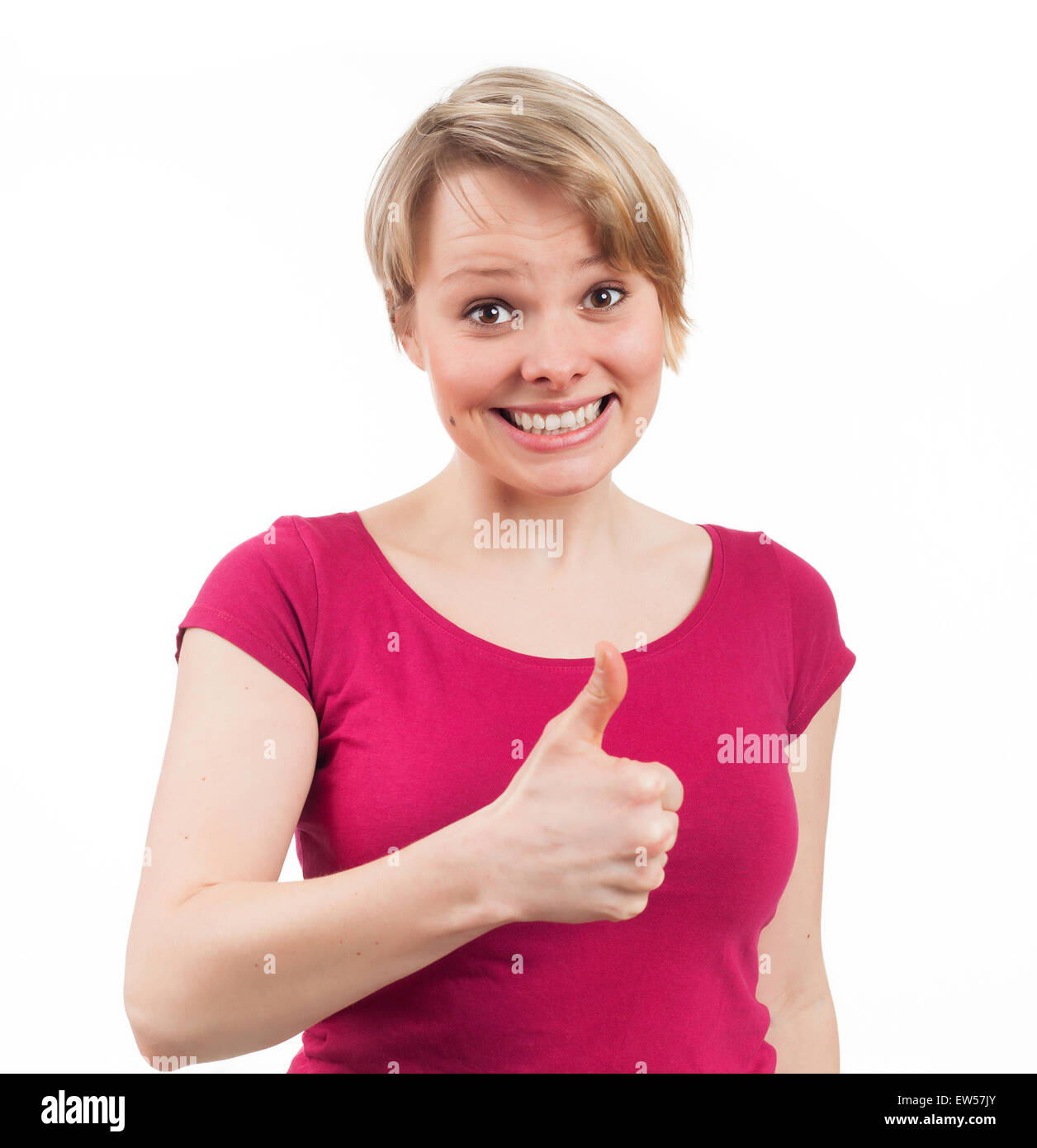 Giovane donna che mostra il suo pollice in alto, isolato su bianco Foto Stock