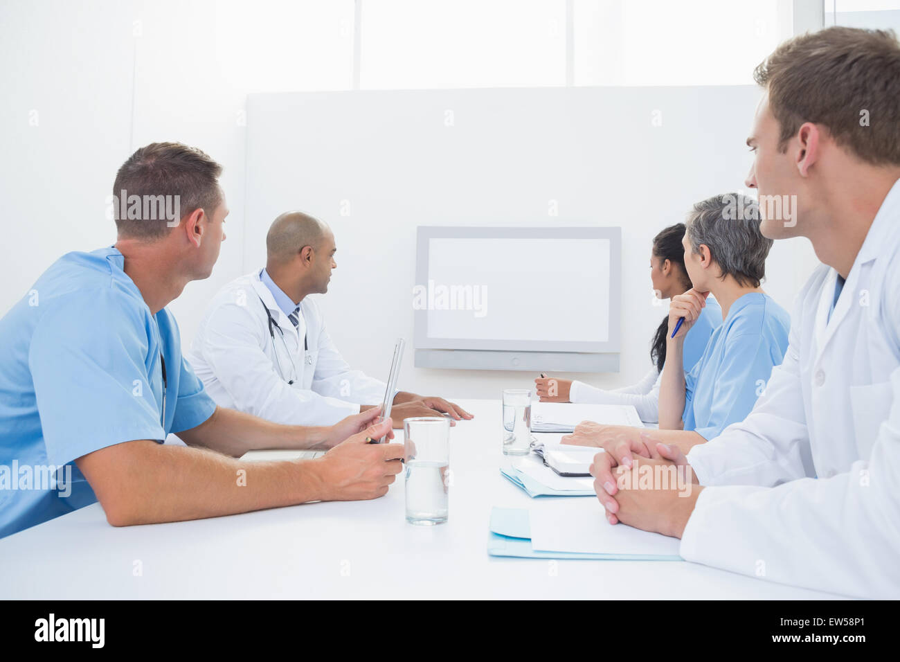 Team di medici aventi una riunione Foto Stock