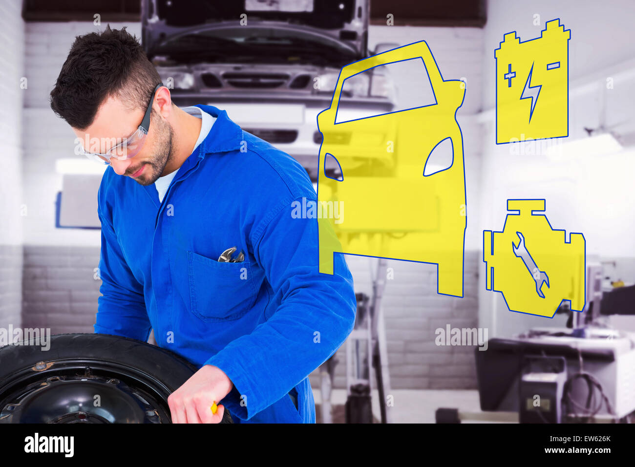 Immagine composita del lavoro meccanico sul pneumatico Foto Stock