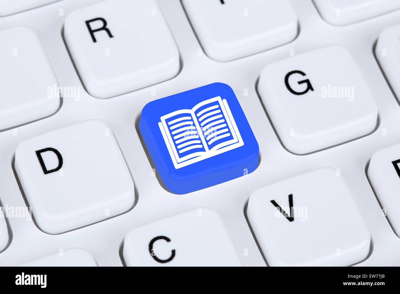 La lettura di un libro sul computer internet icona tastiera symbol Foto Stock