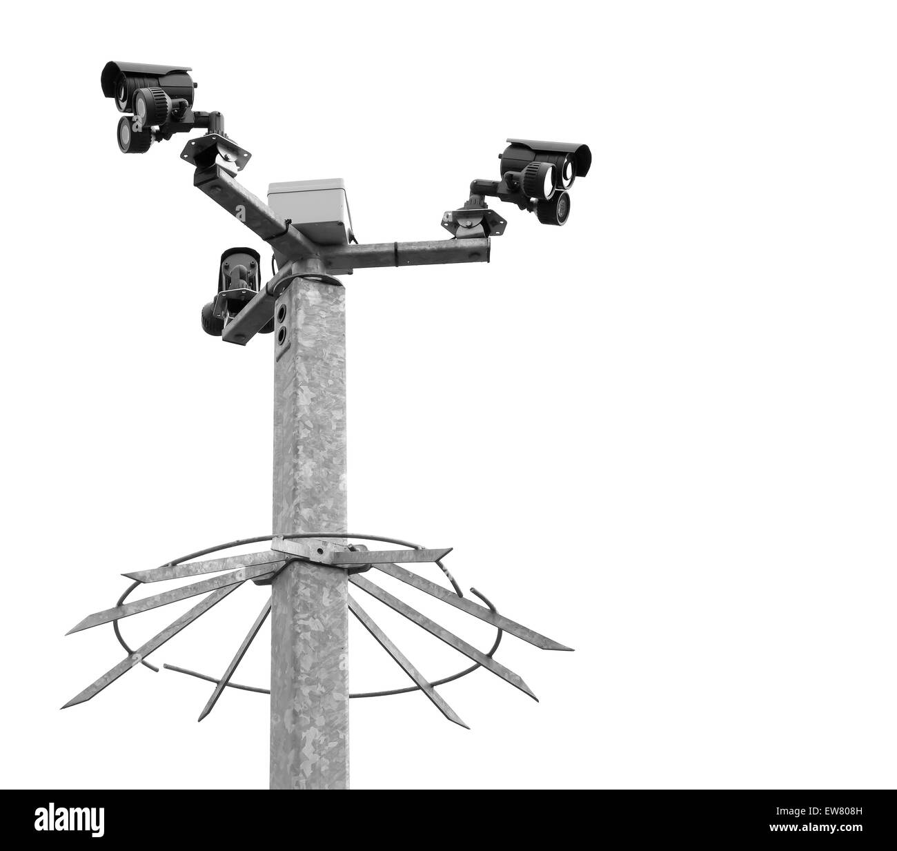 Le telecamere di sicurezza su un metallo spiked post Foto Stock