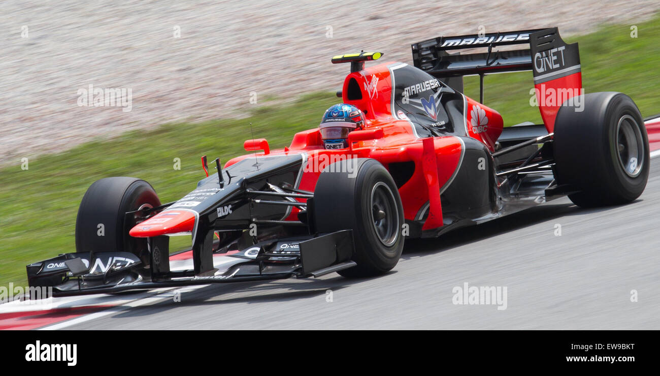 Charles Pic gareggia nel Gran Premio della Malesia 2012, guidando per la Marussia F1 Team. La gara si svolse al Sepang International Circuit, segnando un momento notevole nella sua carriera in Formula 1. Foto Stock