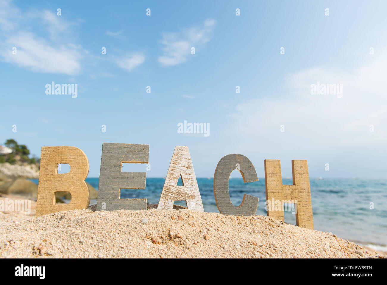 Vintage lettere in legno con word in spiaggia Foto Stock