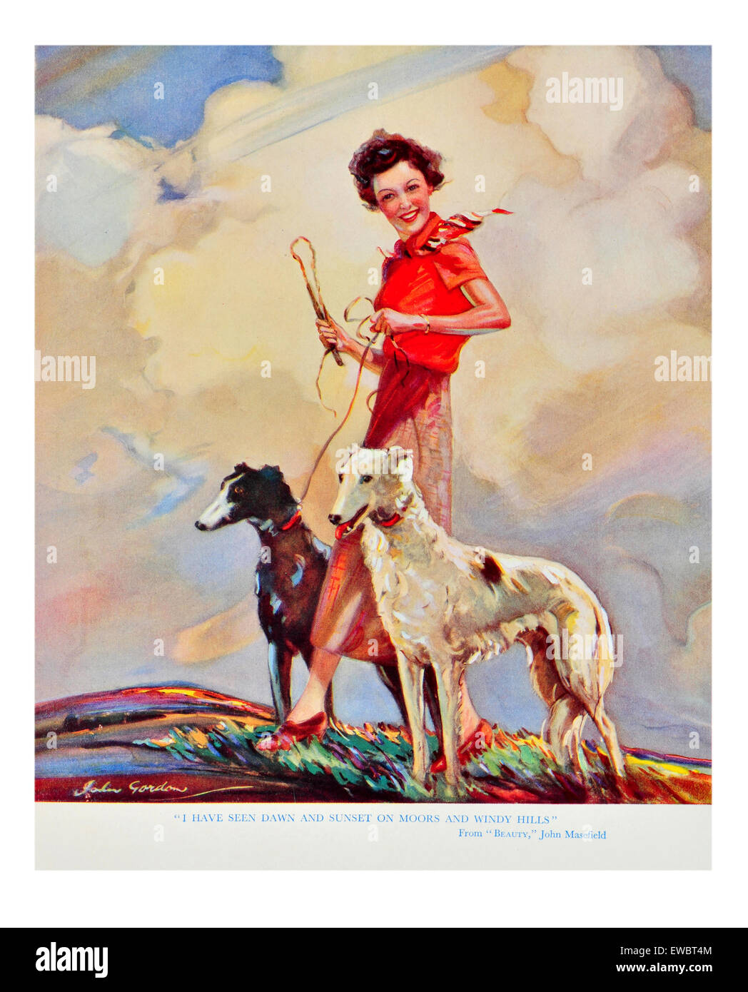 Donna in campagna a piedi con due cani sulla porta Foto Stock