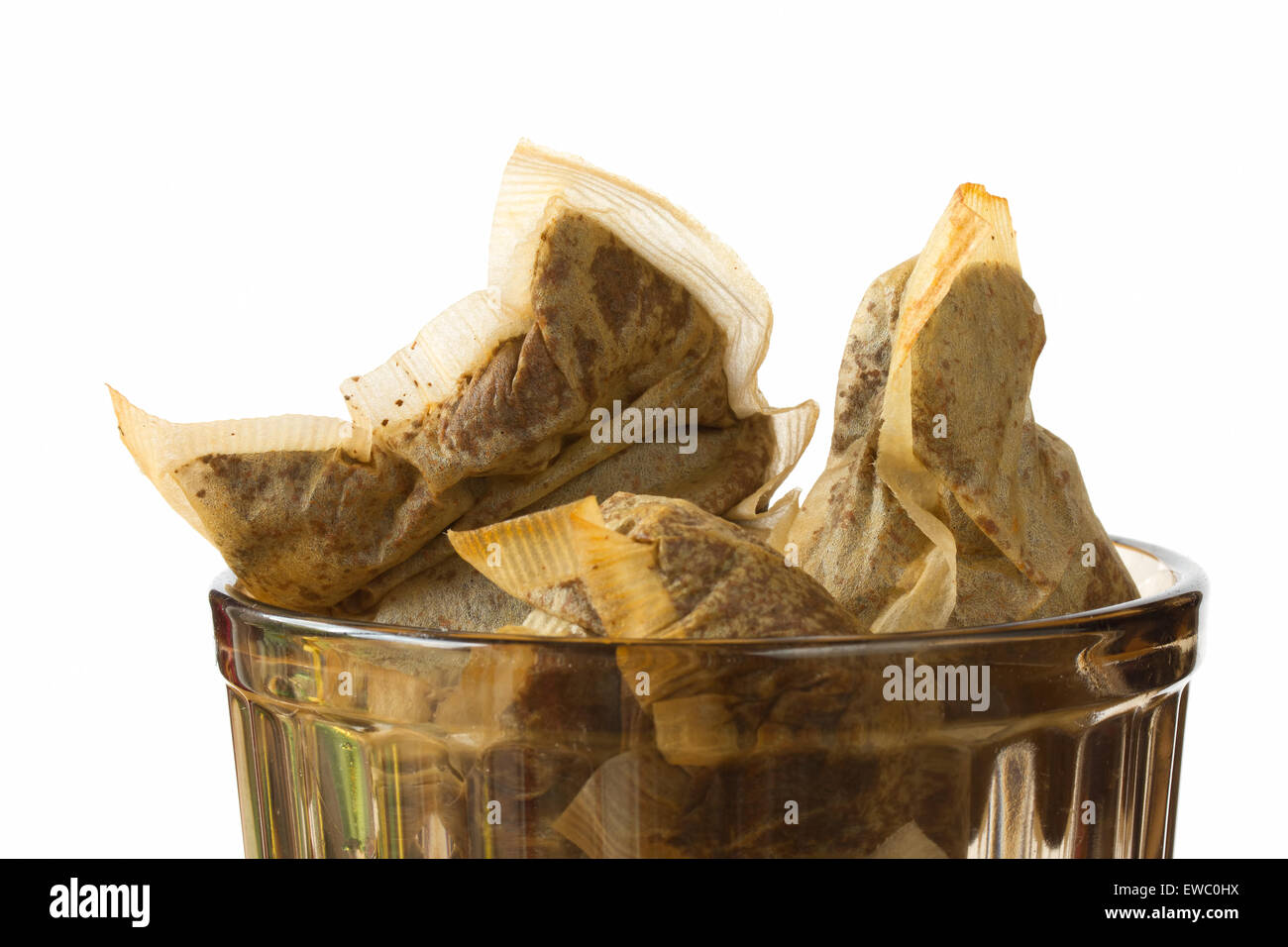Teabags utilizzato in un piatto di vetro Foto Stock