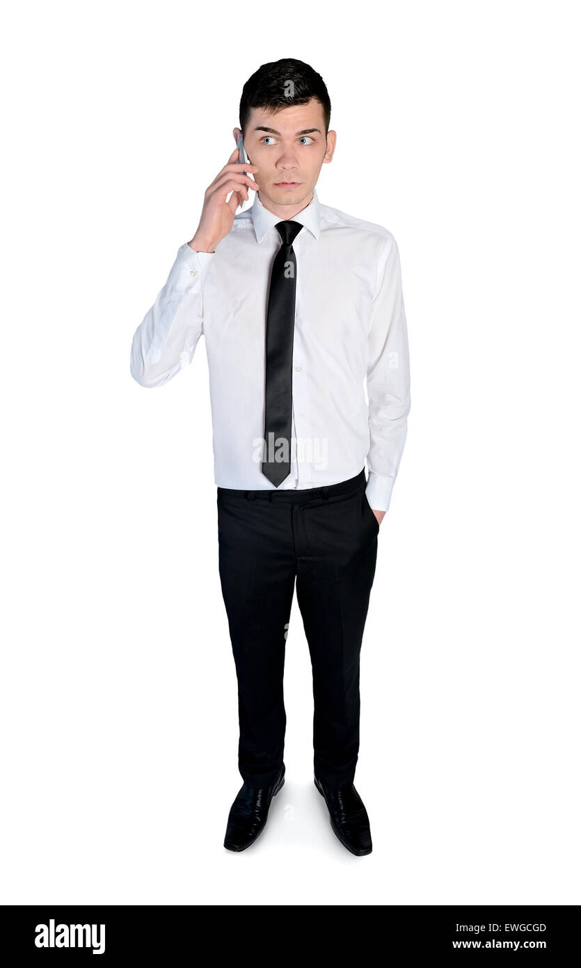 Isolate il business man parlando telefono Foto Stock