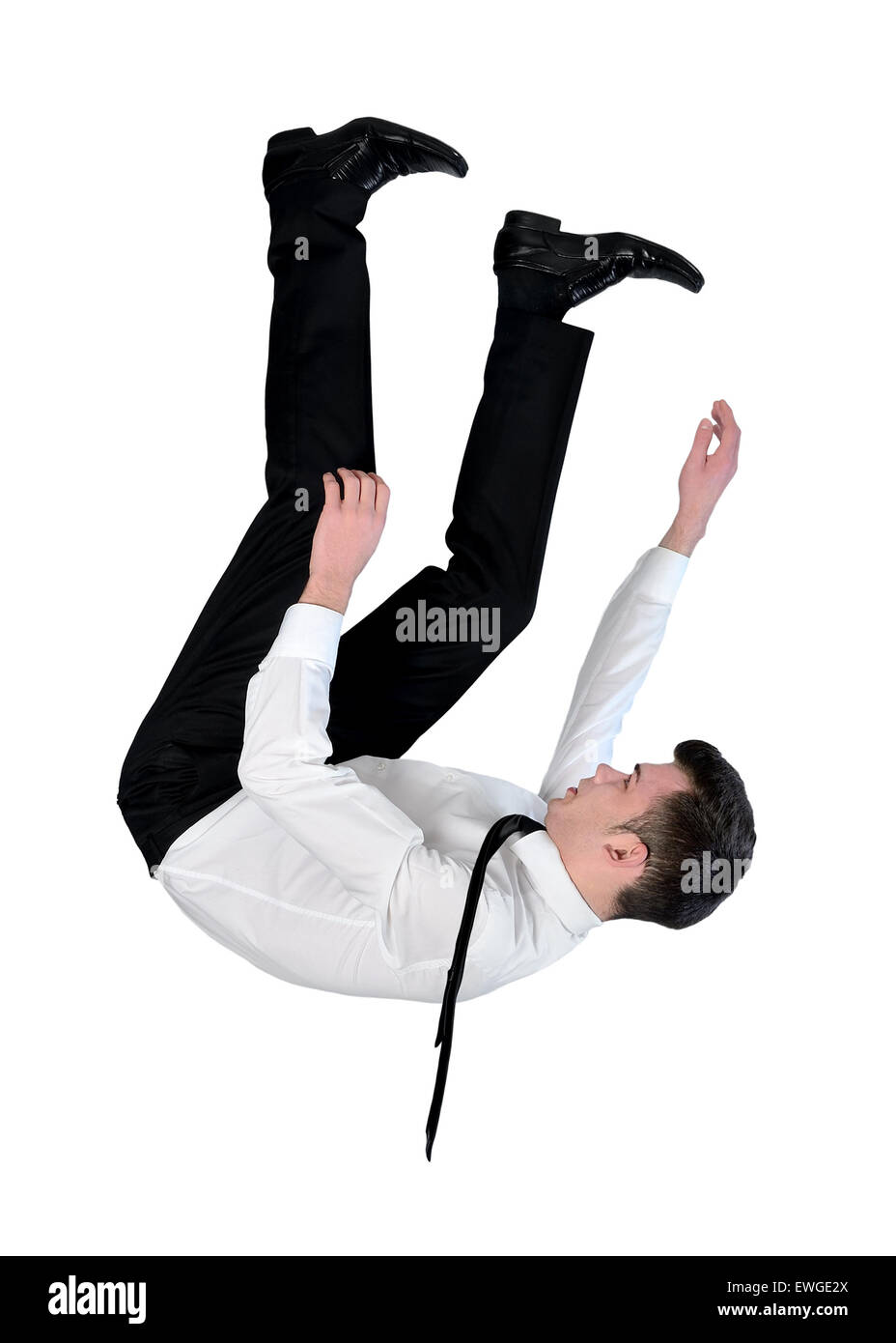 Isolate il business man cadono verso il basso Foto Stock