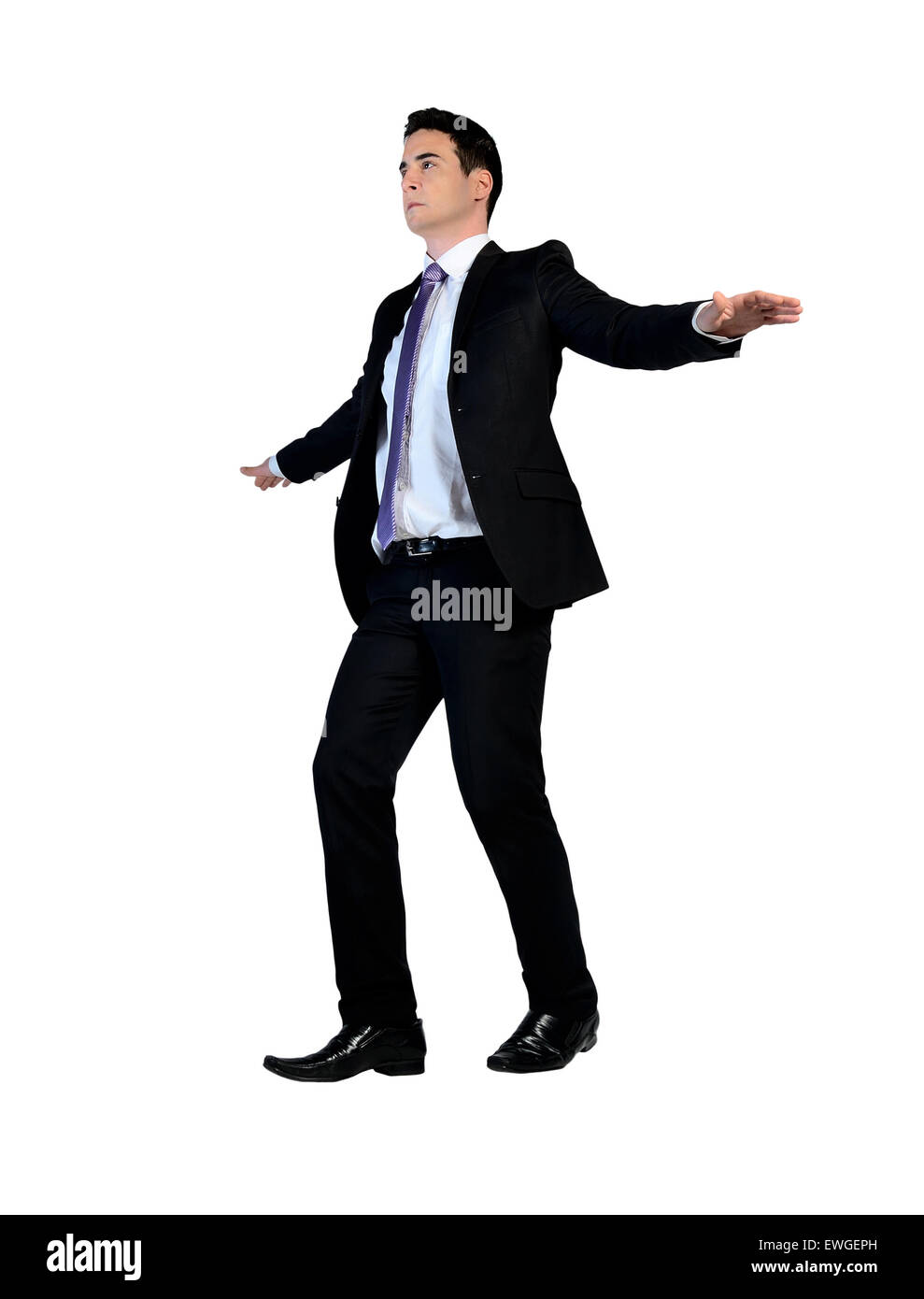 Uomo d'affari a piedi sulla corda immaginaria Foto Stock