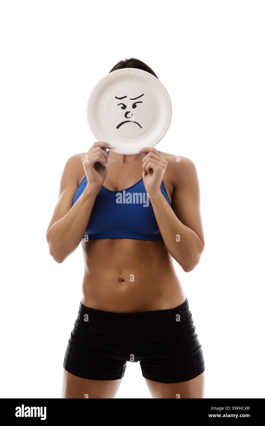 Donna Che Indossa Reggiseno Sportivo E Pantaloncini Tenendo