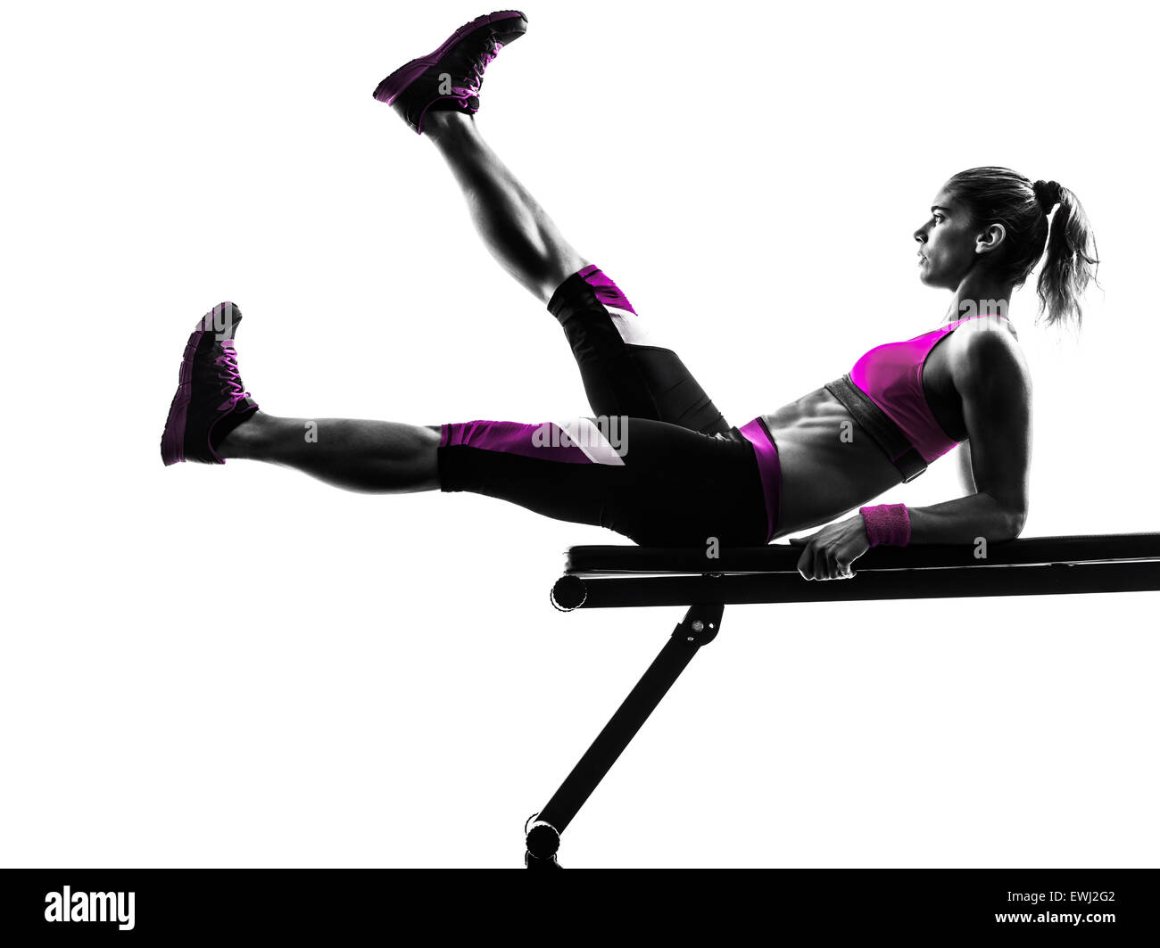 Una donna caucasica esercizio fitness in studio silhouette isolati su sfondo bianco Foto Stock