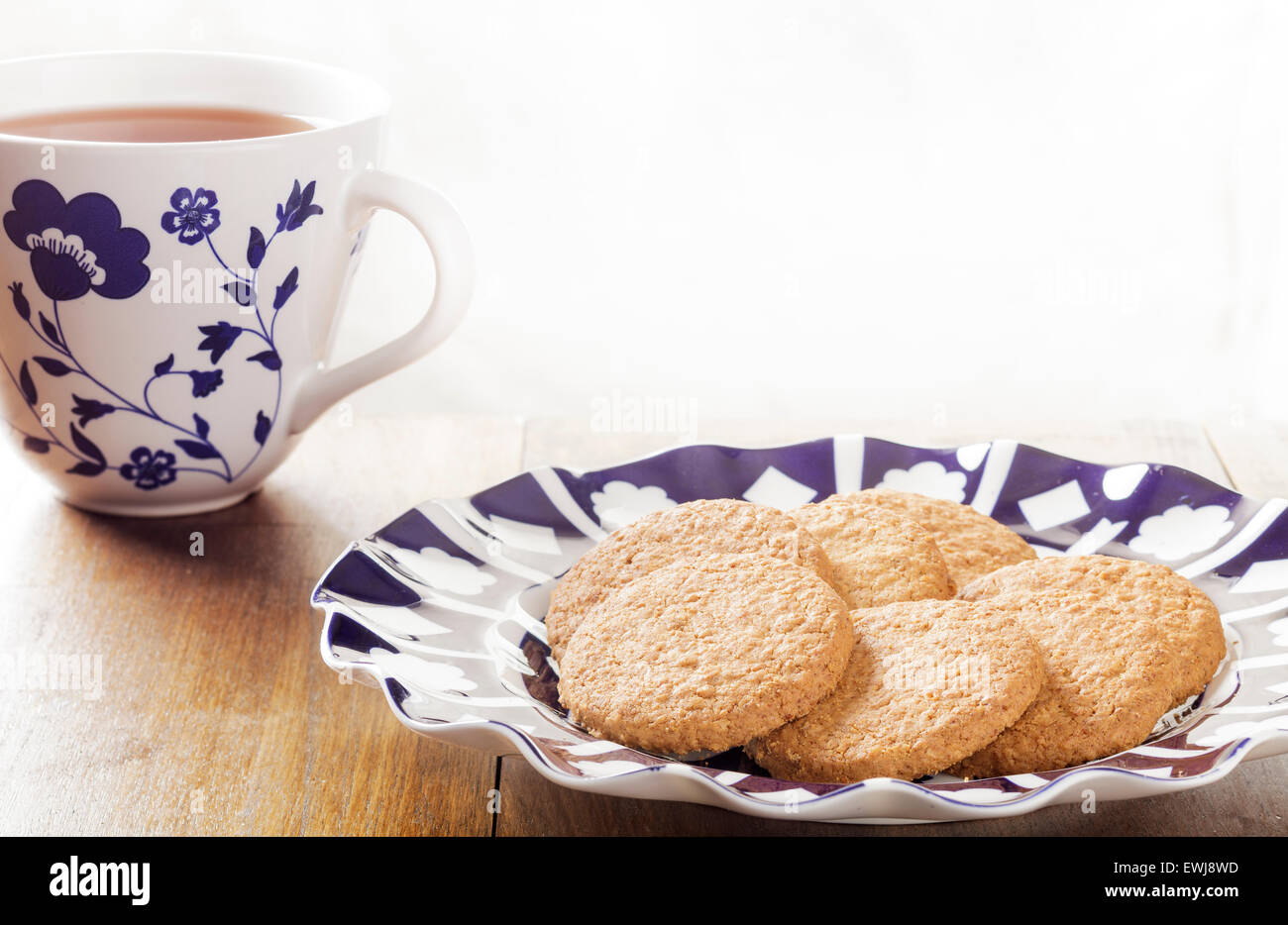 Il tè e i biscotti Foto Stock