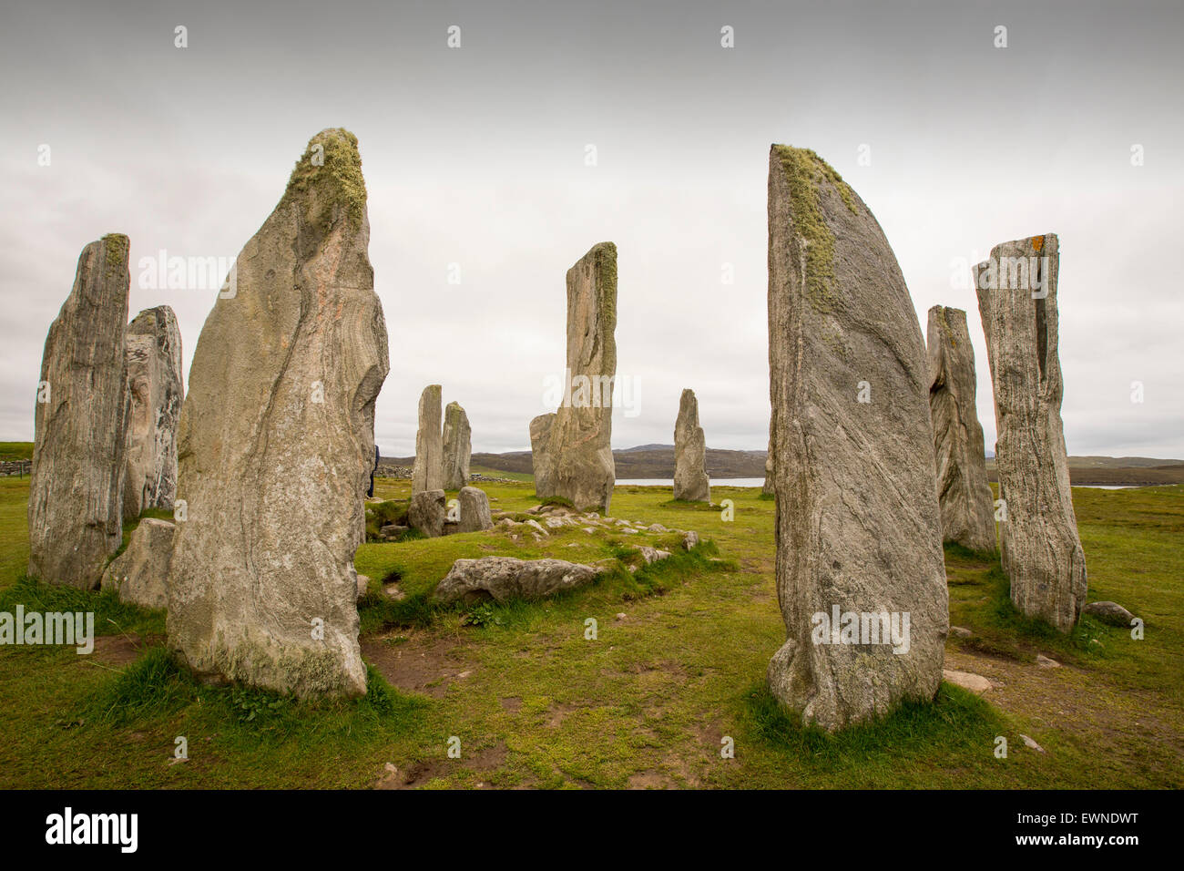 Callanish pietre permanente e il cerchio di pietra dell'isola di Lewis nei pressi di Stornoway, Ebridi Esterne, Scotland, Regno Unito. Il cerchio di pietra è probabilmente il più imponente cerchio di pietra nel Regno Unito, dopo Stonehenge. Foto Stock