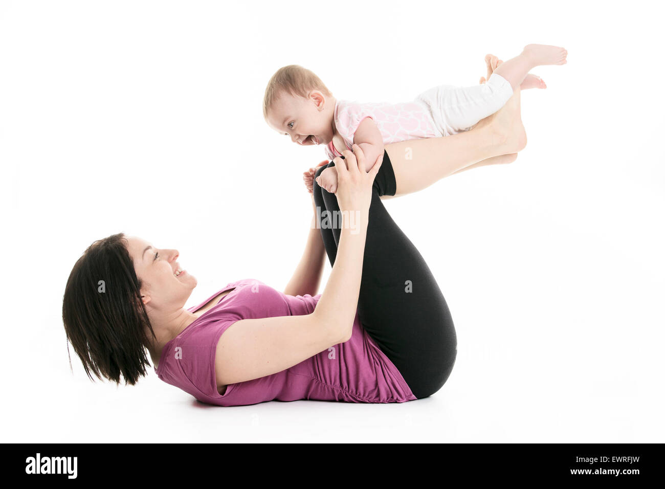 La madre e il bambino ginnastica yoga Foto Stock