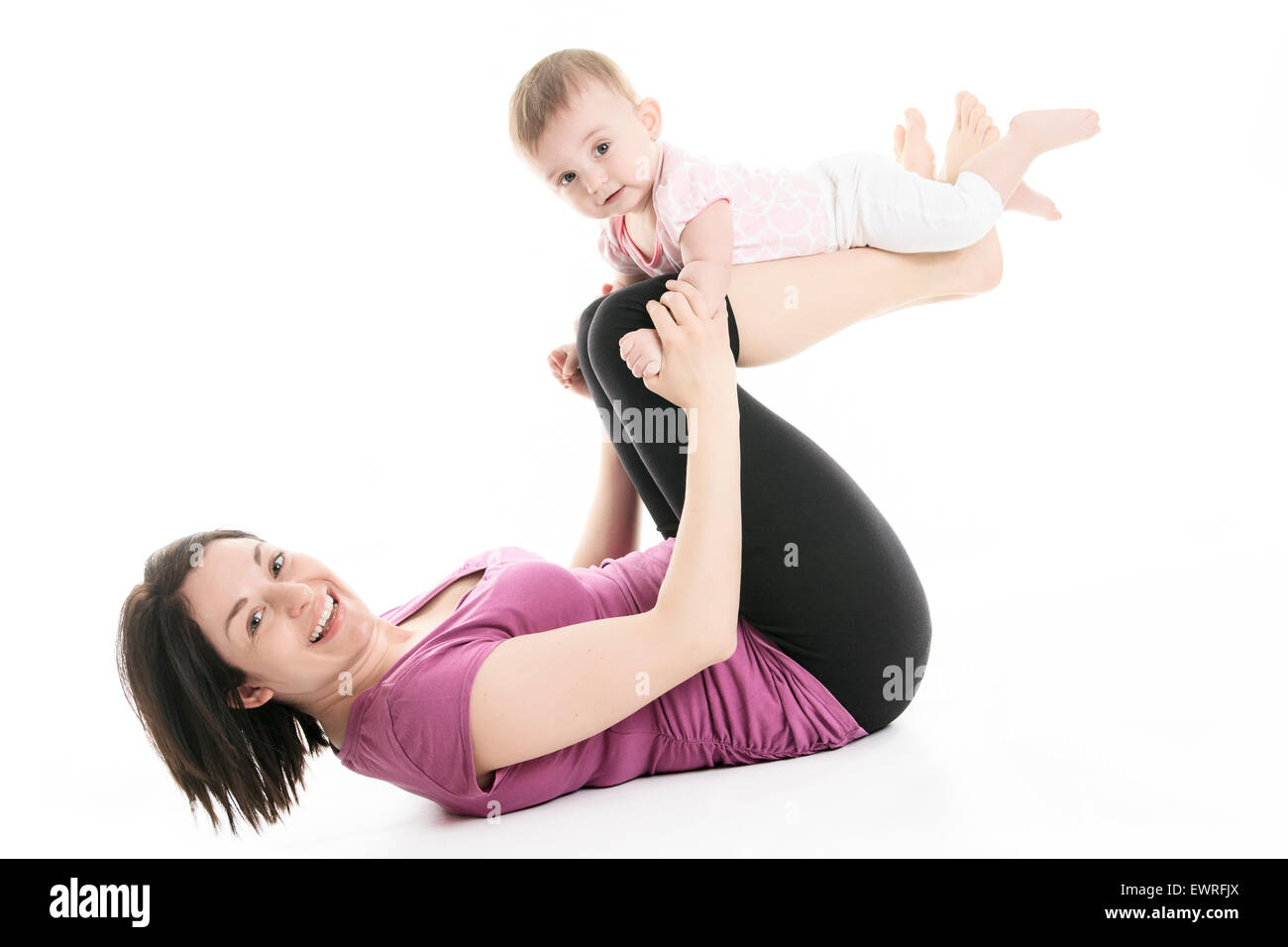 La madre e il bambino ginnastica yoga Foto Stock