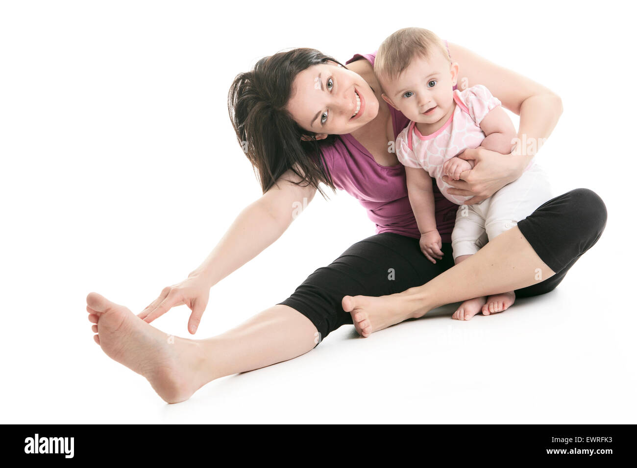 La madre e il bambino ginnastica yoga Foto Stock