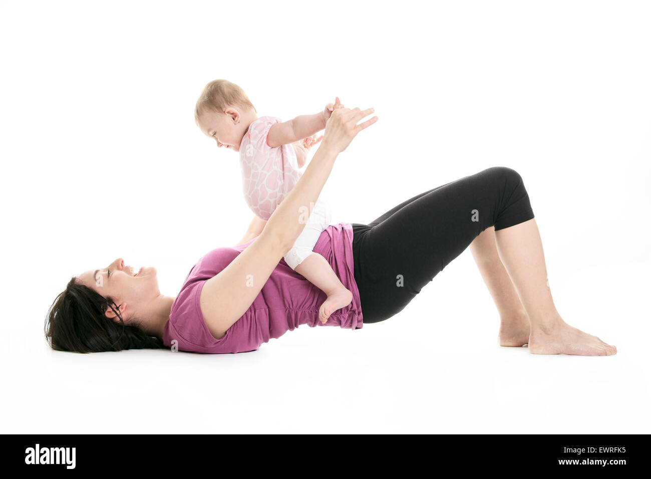 La madre e il bambino ginnastica yoga Foto Stock