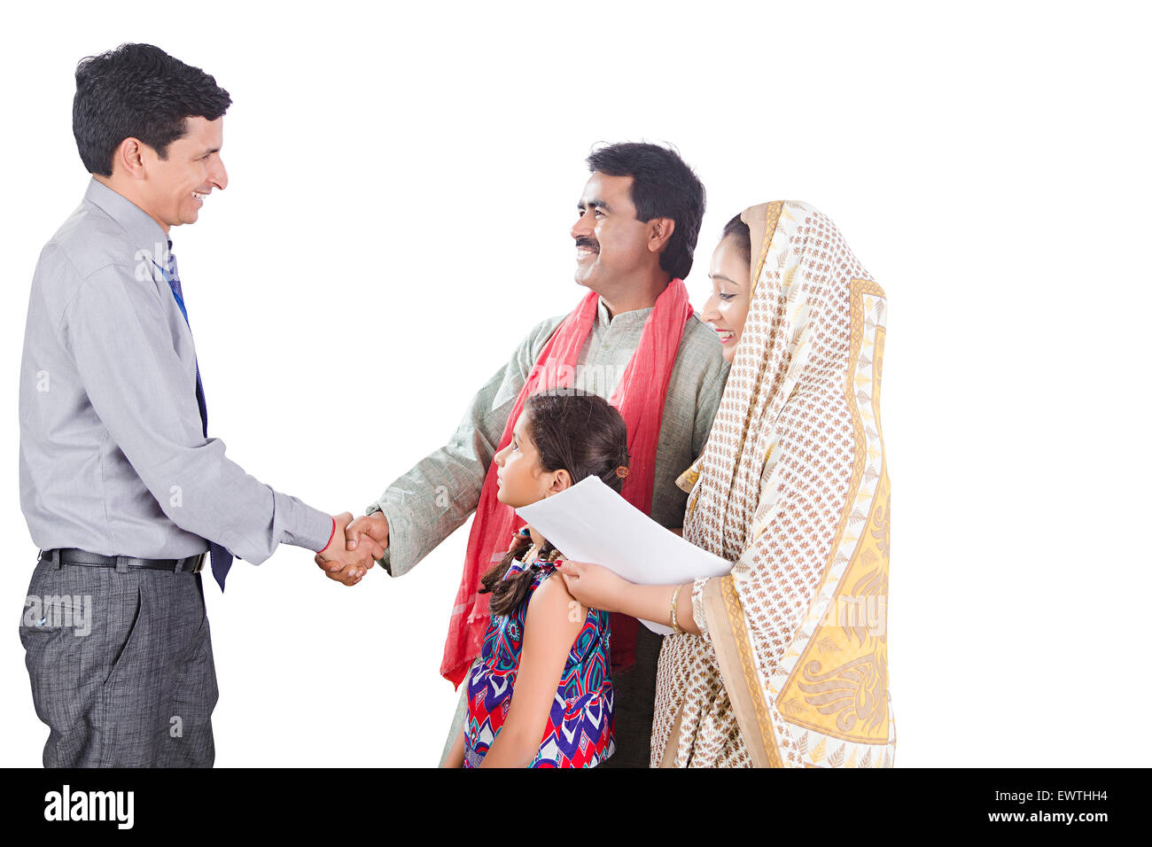 Rurale indiano genitori e venditore di fronte Foto Stock