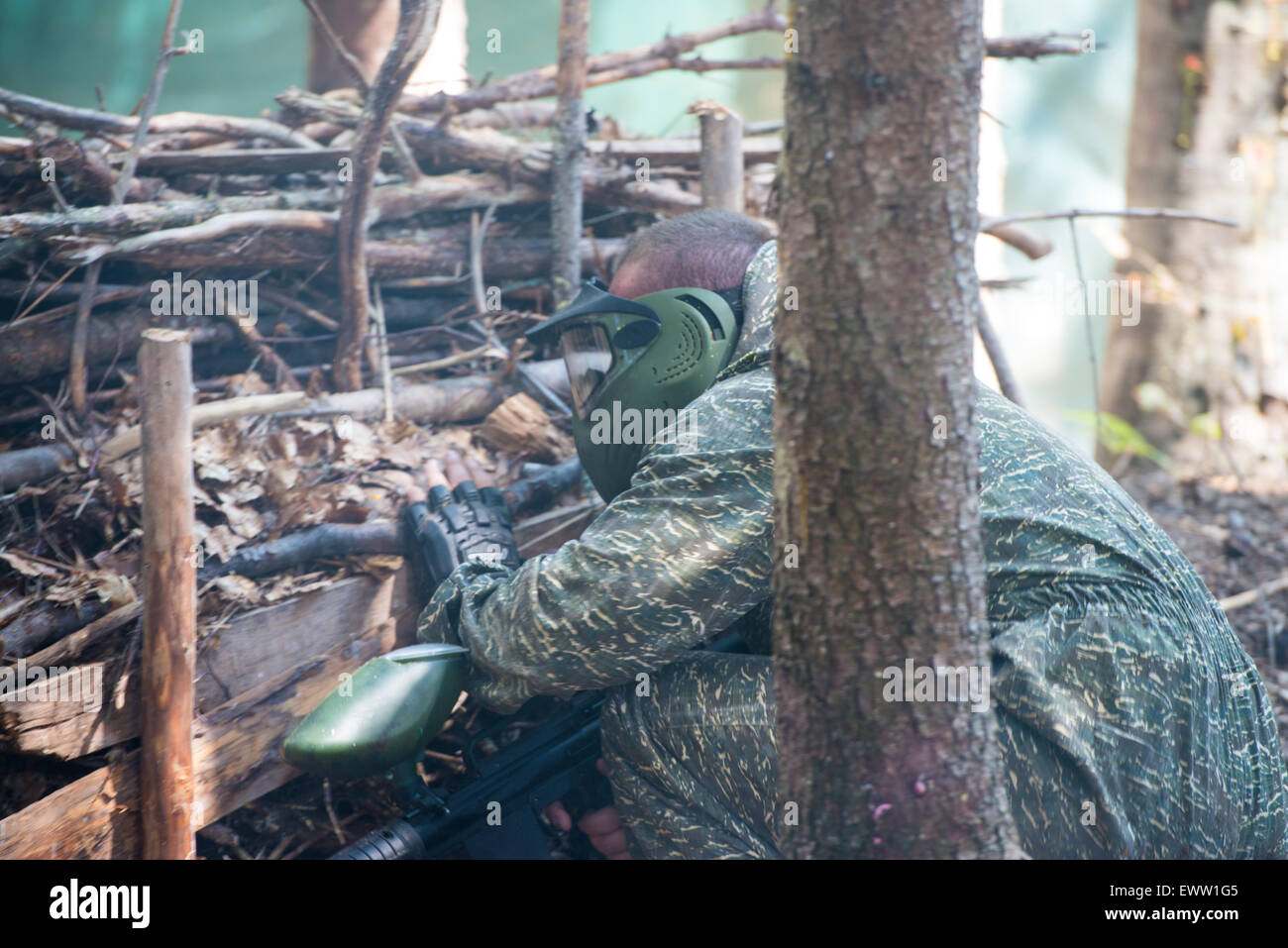 Gioco in un Paintball Foto Stock