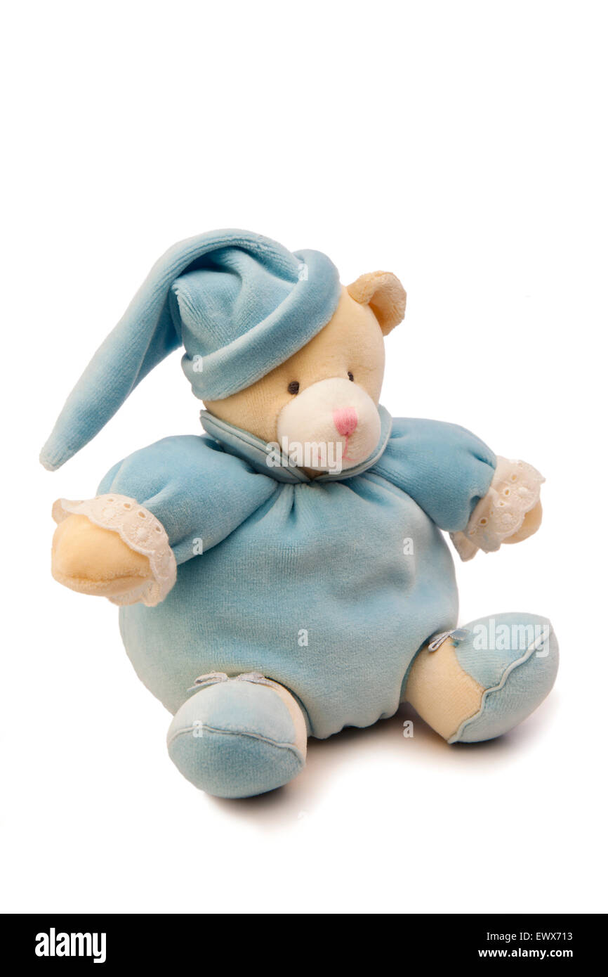 Giocattoli per bambini prima di addormentarsi in peluche orsetto in pigiami blu Foto Stock