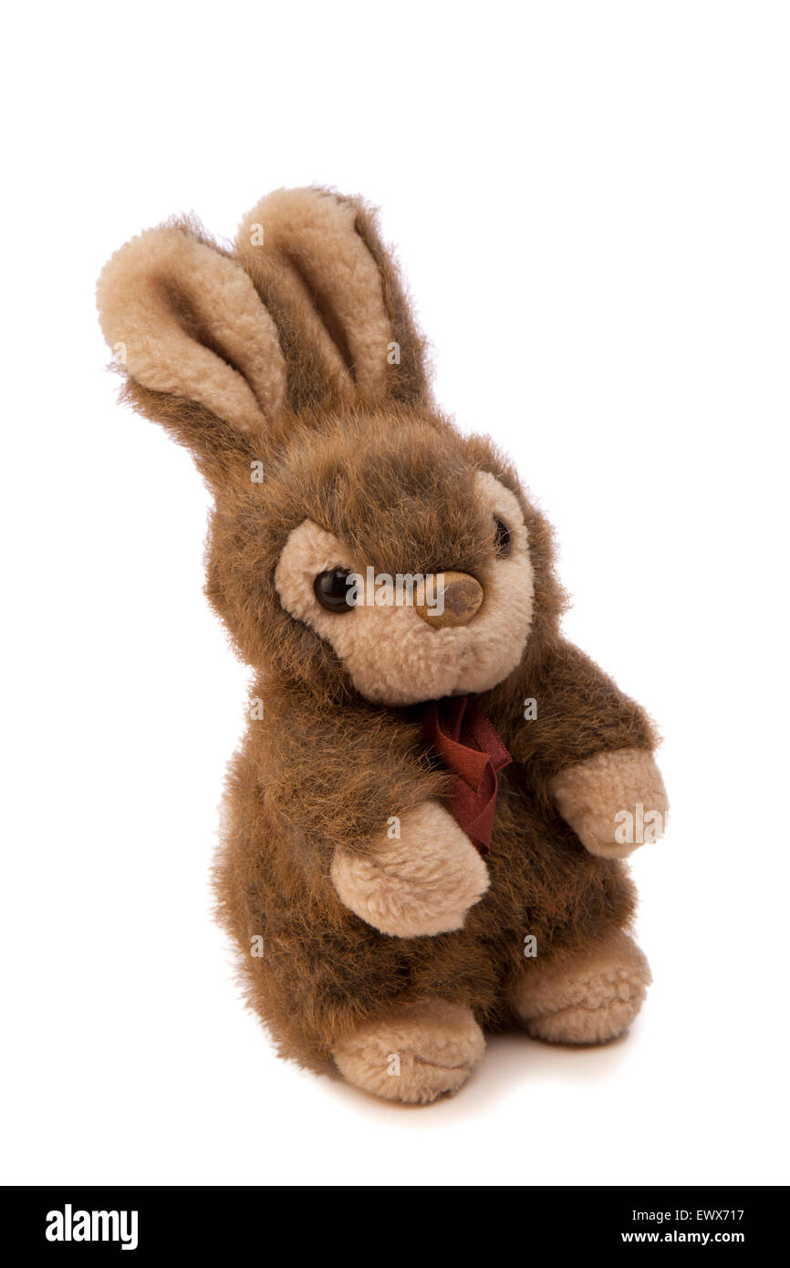 Giocattoli per bambini coniglio peluche giocattolo morbido con nastro rosso attorno al collo Foto Stock